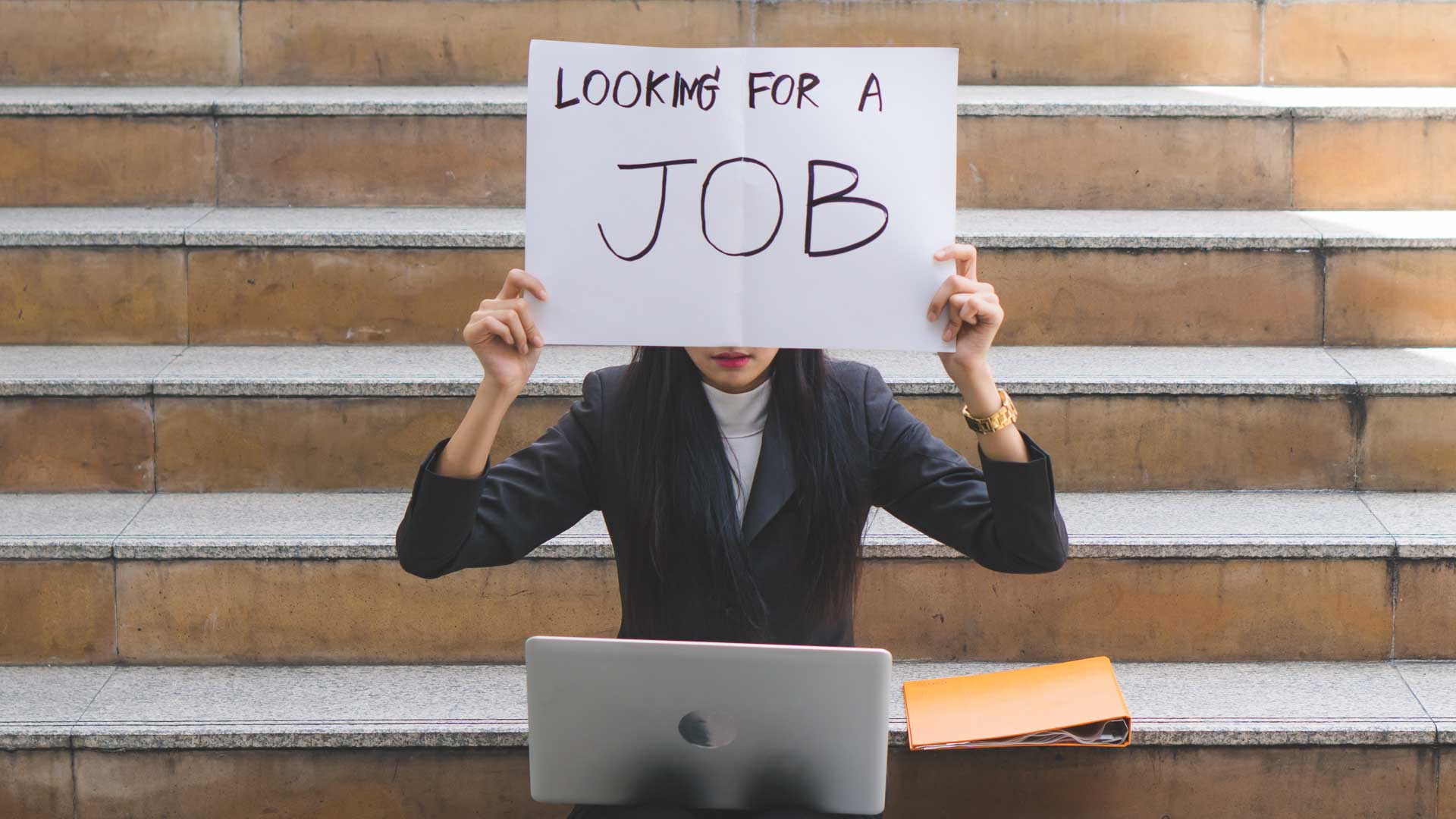 Asian business woman trying to find job and showing paper sign t Work Trends banner
